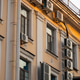 Facade of building with many air conditioners on windows in southern hot country. Escape from heat Facade of building with many air conditioners on windows in southern hot country. Escape from heat - PhotoDune Item for Sale