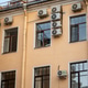 Facade of building with many air conditioners on windows in southern hot country. Escape from heat Facade of building with many air conditioners on windows in southern hot country. Escape from heat - PhotoDune Item for Sale