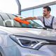 Man Washing Car Windshield Man Washing Car Windshield - PhotoDune Item for Sale