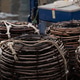 Traditional wicker crayfish traps stacked on commercial fishing boat deck Traditional wicker crayfish traps stacked on commercial fishing boat deck - PhotoDune Item for Sale