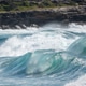Powerful surf break with large breaking waves under overcast sky Powerful surf break with large breaking waves under overcast sky - PhotoDune Item for Sale