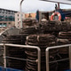 Traditional wicker crayfish pots stacked on a commercial fishing boat Traditional wicker crayfish pots stacked on a commercial fishing boat - PhotoDune Item for Sale