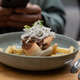 Modern cafe lunch meal featuring a gourmet meat roll and golden french fries in a ceramic dish Modern cafe lunch meal featuring a gourmet meat roll and golden french fries in a ceramic dish - PhotoDune Item for Sale