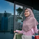 Asian young Muslim woman shopping goods outdoors in department store. Asian young Muslim woman shopping goods outdoors in department store. - PhotoDune Item for Sale