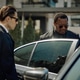 Businessmen Opening Car Door during Executive Security Transfer Businessmen Opening Car Door during Executive Security Transfer - PhotoDune Item for Sale