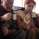 Senior Man and Adult Woman Receiving Warm Drinks at Aid Center Senior Man and Adult Woman Receiving Warm Drinks at Aid Center - PhotoDune Item for Sale