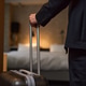 Adult Man Arriving with Suitcase for Business Hotel Stay Adult Man Arriving with Suitcase for Business Hotel Stay - PhotoDune Item for Sale