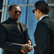 Black Middle Aged Businessman Shaking Hands in Corporate Meeting Black Middle Aged Businessman Shaking Hands in Corporate Meeting - PhotoDune Item for Sale
