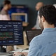 Adult Man Coding at Computer in Information Technology Office Adult Man Coding at Computer in Information Technology Office - PhotoDune Item for Sale