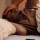 Black Man Lying Awake in Bed Coping with Digital Fatigue at Home Black Man Lying Awake in Bed Coping with Digital Fatigue at Home - PhotoDune Item for Sale