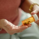 Senior Woman Holding Prescription Pills for Medication Management Senior Woman Holding Prescription Pills for Medication Management - PhotoDune Item for Sale