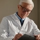 Senior Male Psychiatrist Writing Notes during Patient Evaluation Senior Male Psychiatrist Writing Notes during Patient Evaluation - PhotoDune Item for Sale