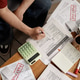 Adult Man Reviewing Past Due Bills and Calculating Household Debt Adult Man Reviewing Past Due Bills and Calculating Household Debt - PhotoDune Item for Sale