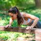 Push up on bench in outdoor gym, focusing on strength, control and proper form. Push up on bench in outdoor gym, focusing on strength, control and proper form. - PhotoDune Item for Sale