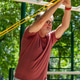 Senior man performing an overhead resistance band exercise in an outdoor fitness area to enhance sho Senior man performing an overhead resistance band exercise in an outdoor fitness area to enhance sho - PhotoDune Item for Sale