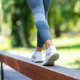 Walking along narrow beam from behind, focusing on stability and coordination during outdoor fitness Walking along narrow beam from behind, focusing on stability and coordination during outdoor fitness - PhotoDune Item for Sale