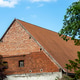 Historic brick building with ceramic roof tiles Historic brick building with ceramic roof tiles - PhotoDune Item for Sale