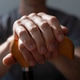 Middle age caucasian man hands holds cane closeup Middle age caucasian man hands holds cane closeup - PhotoDune Item for Sale