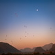 Golden hour panoramic view of Vang Vieng mountain landscape Golden hour panoramic view of Vang Vieng mountain landscape - PhotoDune Item for Sale