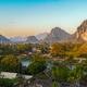 Early morning light over the limestone landscape of Vang Vieng in Laos Early morning light over the limestone landscape of Vang Vieng in Laos - PhotoDune Item for Sale