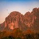 Limestone cliffs at sunset in Vang Vieng Laos Limestone cliffs at sunset in Vang Vieng Laos - PhotoDune Item for Sale