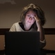 Stressed Middle Aged Woman Working on Laptop lLte at Night at Home Stressed Middle Aged Woman Working on Laptop lLte at Night at Home - PhotoDune Item for Sale