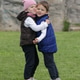 Smiling Toddler Siblings Hugging Outdoors Smiling Toddler Siblings Hugging Outdoors - PhotoDune Item for Sale