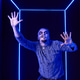 Young man with skeleton face paint reaching out in blue neon light frame Young man with skeleton face paint reaching out in blue neon light frame - PhotoDune Item for Sale