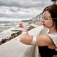 Young woman cosplay silver tribal makeup coastal promenade overcast sky Young woman cosplay silver tribal makeup coastal promenade overcast sky - PhotoDune Item for Sale