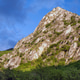 Rocks rise high in Matka Canyon near Skopje with clouds above and greenery on the slopes Rocks rise high in Matka Canyon near Skopje with clouds above and greenery on the slopes - PhotoDune Item for Sale