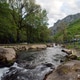Canyon view in Matka near Skopje shows flowing water and green trees in North Macedonia. Canyon view in Matka near Skopje shows flowing water and green trees in North Macedonia. - PhotoDune Item for Sale