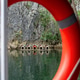 View of small houses on water in Matka Canyon near Skopje in North Macedonia View of small houses on water in Matka Canyon near Skopje in North Macedonia - PhotoDune Item for Sale