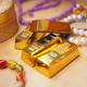 Golden treasures surrounded by colorful beads and jewelry Golden treasures surrounded by colorful beads and jewelry - PhotoDune Item for Sale