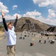 Visitor celebrates at Pyramid of the Moon in Teotihuacan archaeological site in Mexico Visitor celebrates at Pyramid of the Moon in Teotihuacan archaeological site in Mexico - PhotoDune Item for Sale