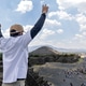 Tourist celebrates at Avenue of the Dead in Teotihuacan archaeological site in Mexico Tourist celebrates at Avenue of the Dead in Teotihuacan archaeological site in Mexico - PhotoDune Item for Sale