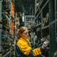 Technician adult women worker working in heavy industry, warehouse manager in garage scrap yard Technician adult women worker working in heavy industry, warehouse manager in garage scrap yard - PhotoDune Item for Sale