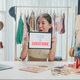 Young Asia lady beauty blogger wear crop top looking at camera use digital tablet show screen online Young Asia lady beauty blogger wear crop top looking at camera use digital tablet show screen online - PhotoDune Item for Sale