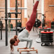 Calisthenics athlete showing impressive female strength balance Calisthenics athlete showing impressive female strength balance - PhotoDune Item for Sale