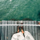 POV Wooden Pier Over Turquoise Water POV Wooden Pier Over Turquoise Water - PhotoDune Item for Sale