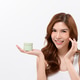 Skincare Routine Showcasing a Woman With a Jar of Cream in a Bright Setting Skincare Routine Showcasing a Woman With a Jar of Cream in a Bright Setting - PhotoDune Item for Sale
