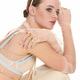 Young beautiful woman in alluring pose showcasing natural beauty and elegant style in a studio Young beautiful woman in alluring pose showcasing natural beauty and elegant style in a studio - PhotoDune Item for Sale
