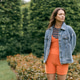 Young woman enjoys a peaceful moment in a stylish outfit while surrounded by nature in a park Young woman enjoys a peaceful moment in a stylish outfit while surrounded by nature in a park - PhotoDune Item for Sale
