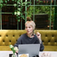 Cozy moments in a vibrant cafe with a stylish non binary person immersed in creativity Cozy moments in a vibrant cafe with a stylish non binary person immersed in creativity - PhotoDune Item for Sale