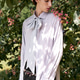 Stylish young man embodies retro chic fashion in a floral outdoor setting Stylish young man embodies retro chic fashion in a floral outdoor setting - PhotoDune Item for Sale