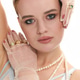 Young beautiful woman expressing allure and charm in stylish studio setting with elegant accessories Young beautiful woman expressing allure and charm in stylish studio setting with elegant accessories - PhotoDune Item for Sale