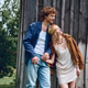 Young couple enjoys a carefree summer day in a rustic outdoor setting Young couple enjoys a carefree summer day in a rustic outdoor setting - PhotoDune Item for Sale