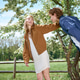 Young couple enjoying a summer day together in a picturesque rural setting Young couple enjoying a summer day together in a picturesque rural setting - PhotoDune Item for Sale
