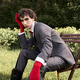 Stylish young man showcases unique fashion in summer park setting Stylish young man showcases unique fashion in summer park setting - PhotoDune Item for Sale