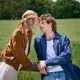 Young couple share a romantic moment outdoors in beautiful summer nature Young couple share a romantic moment outdoors in beautiful summer nature - PhotoDune Item for Sale