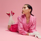 Young woman exudes fashion and elegance with striking pink outfit and playful pose Young woman exudes fashion and elegance with striking pink outfit and playful pose - PhotoDune Item for Sale
